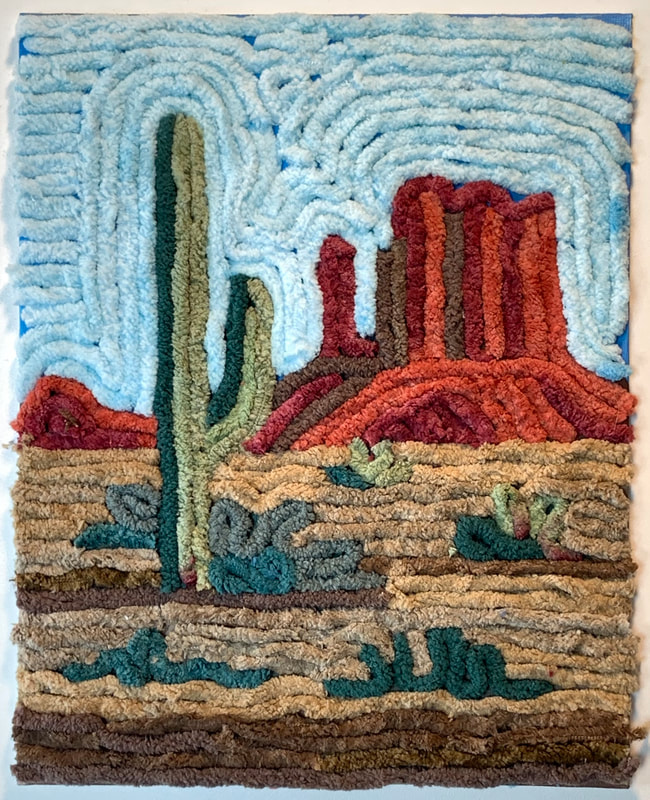 Saguaro cactus and butte yarn painting